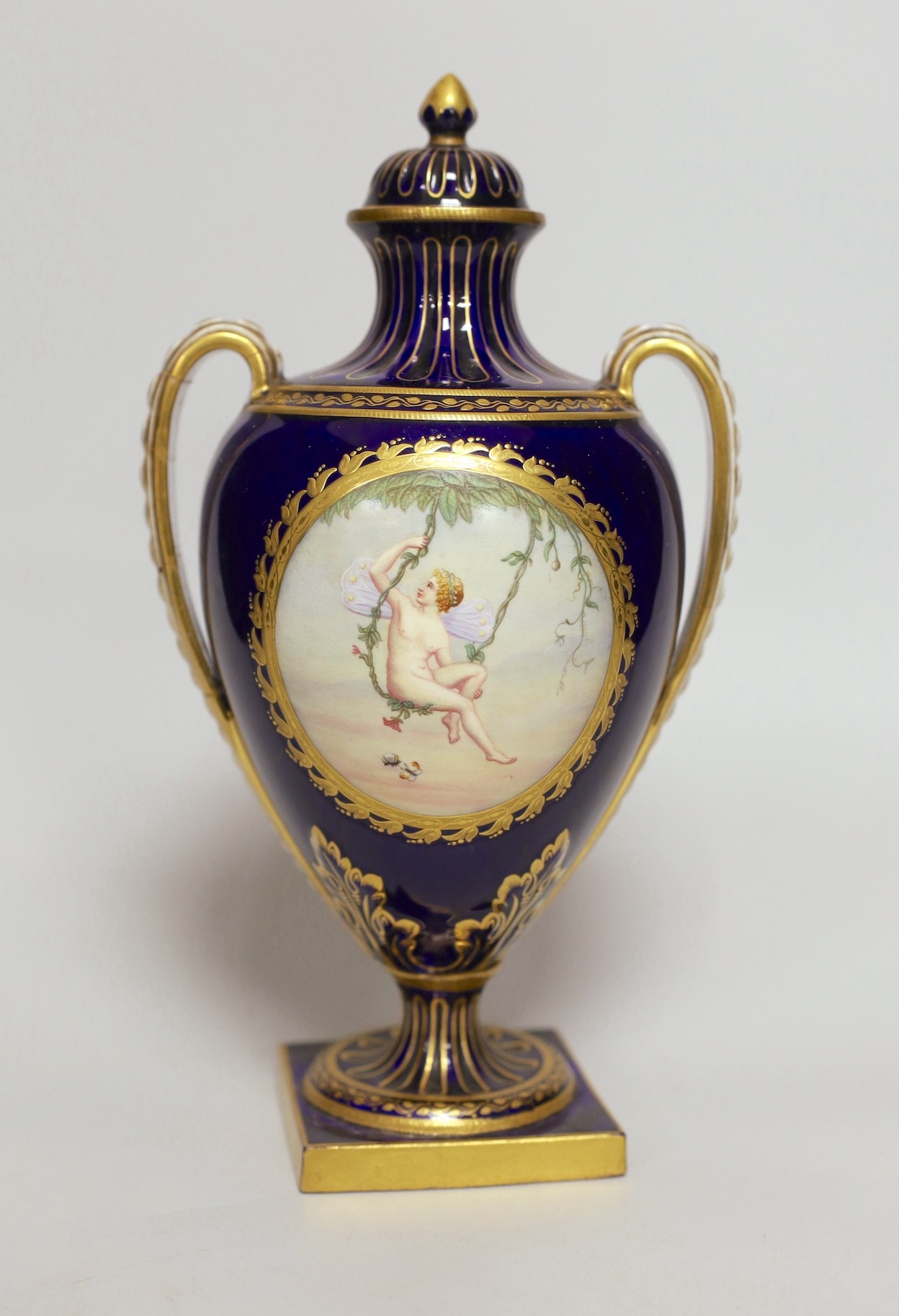 A Minton vase and cover painted with an unclothed fairy swinging from a vine, strongly attributed to Antonin Boullemier. 25cm